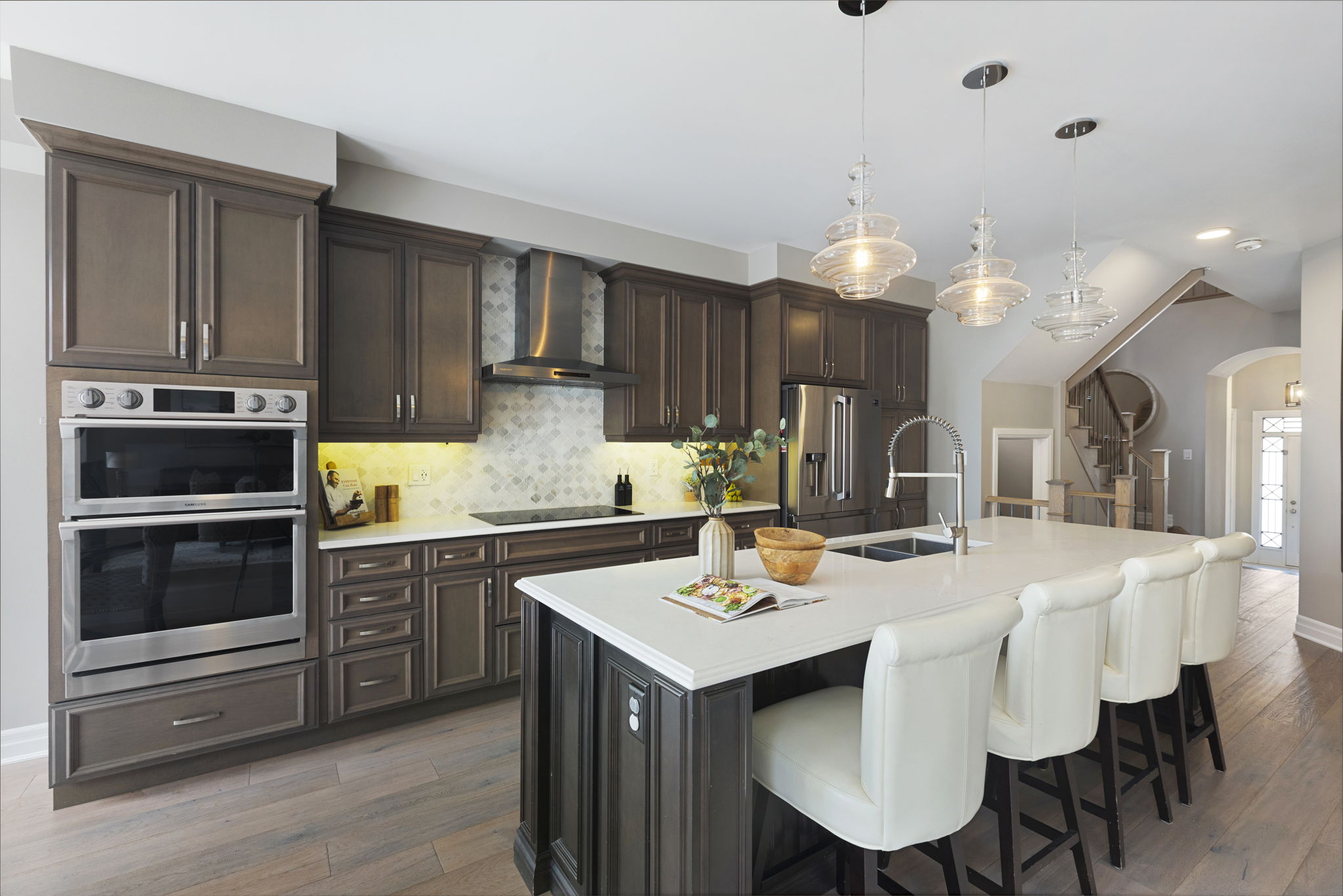 Chef inspired kitchen with extended cabinetry