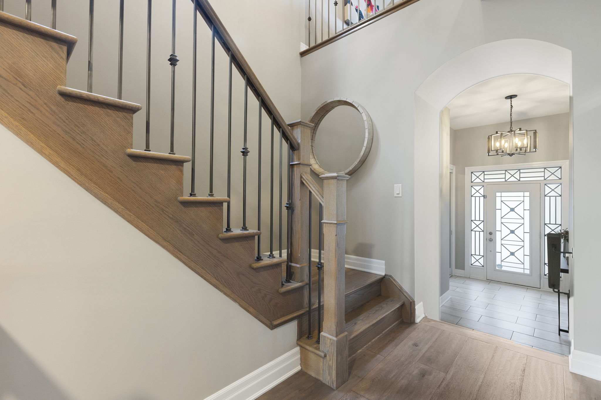 Oak staircase with wrought iron pickets