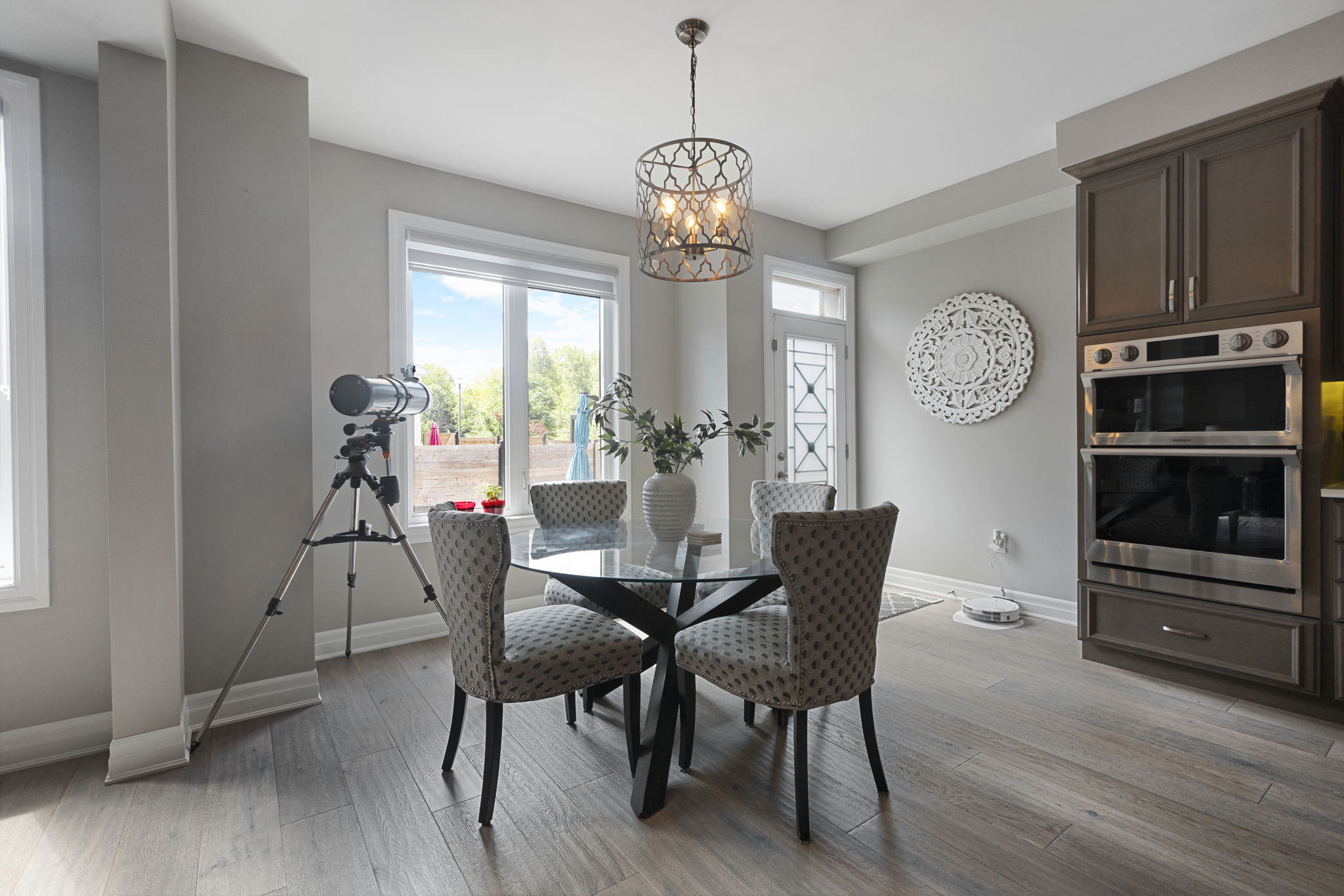 Formal dining room with designer chandelier