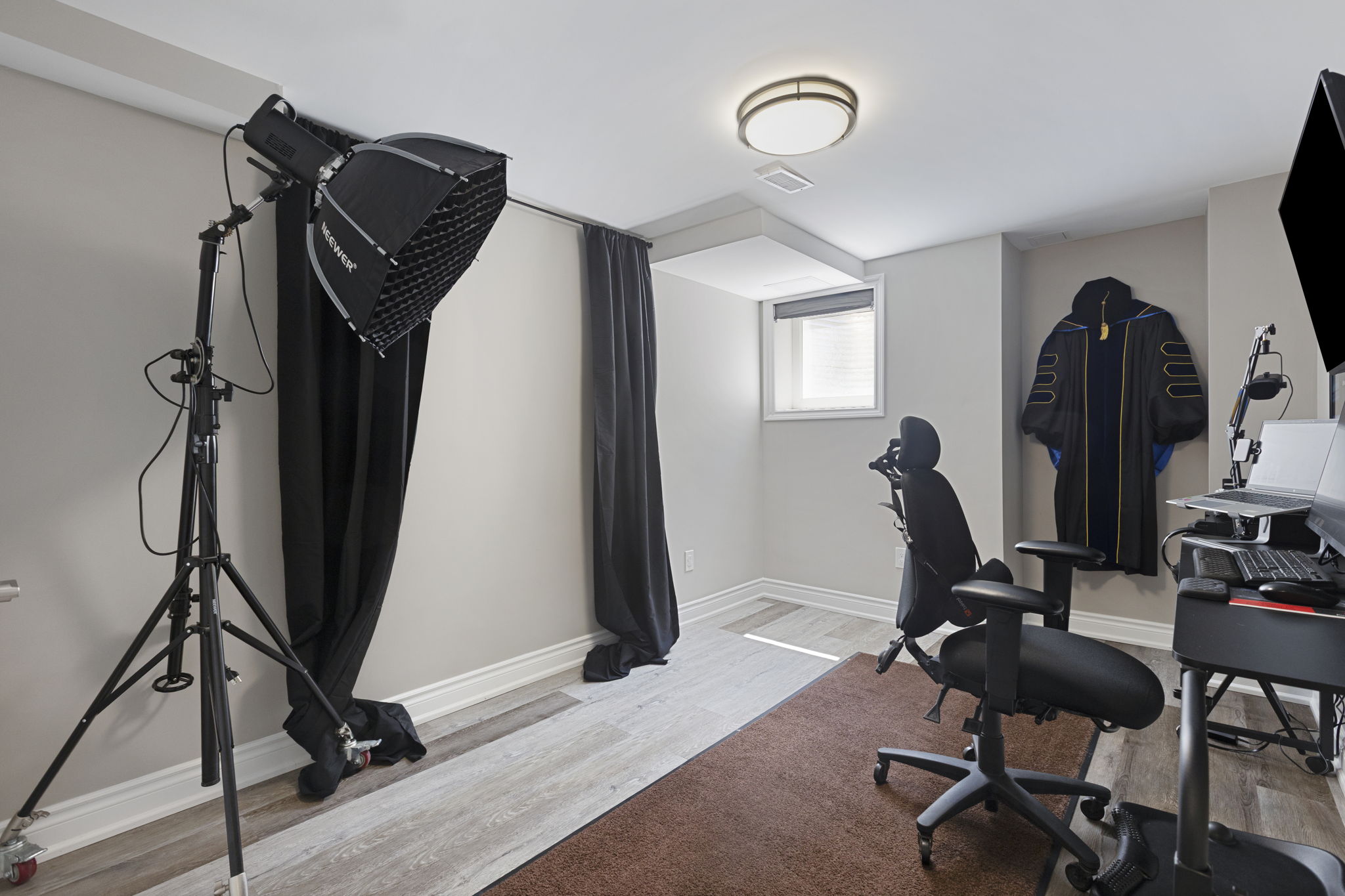 Lower level bedroom used as a studio